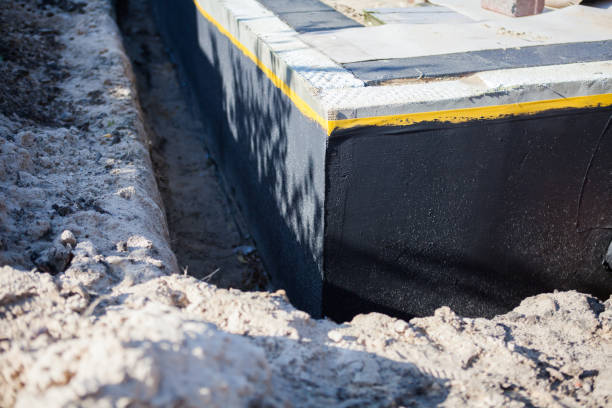 Professional Waterproofing technician working in Sterling, IL